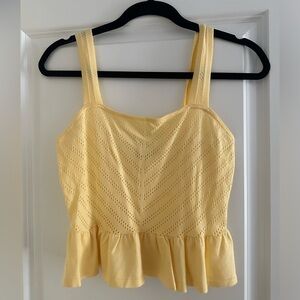 Yellow peplum tank top